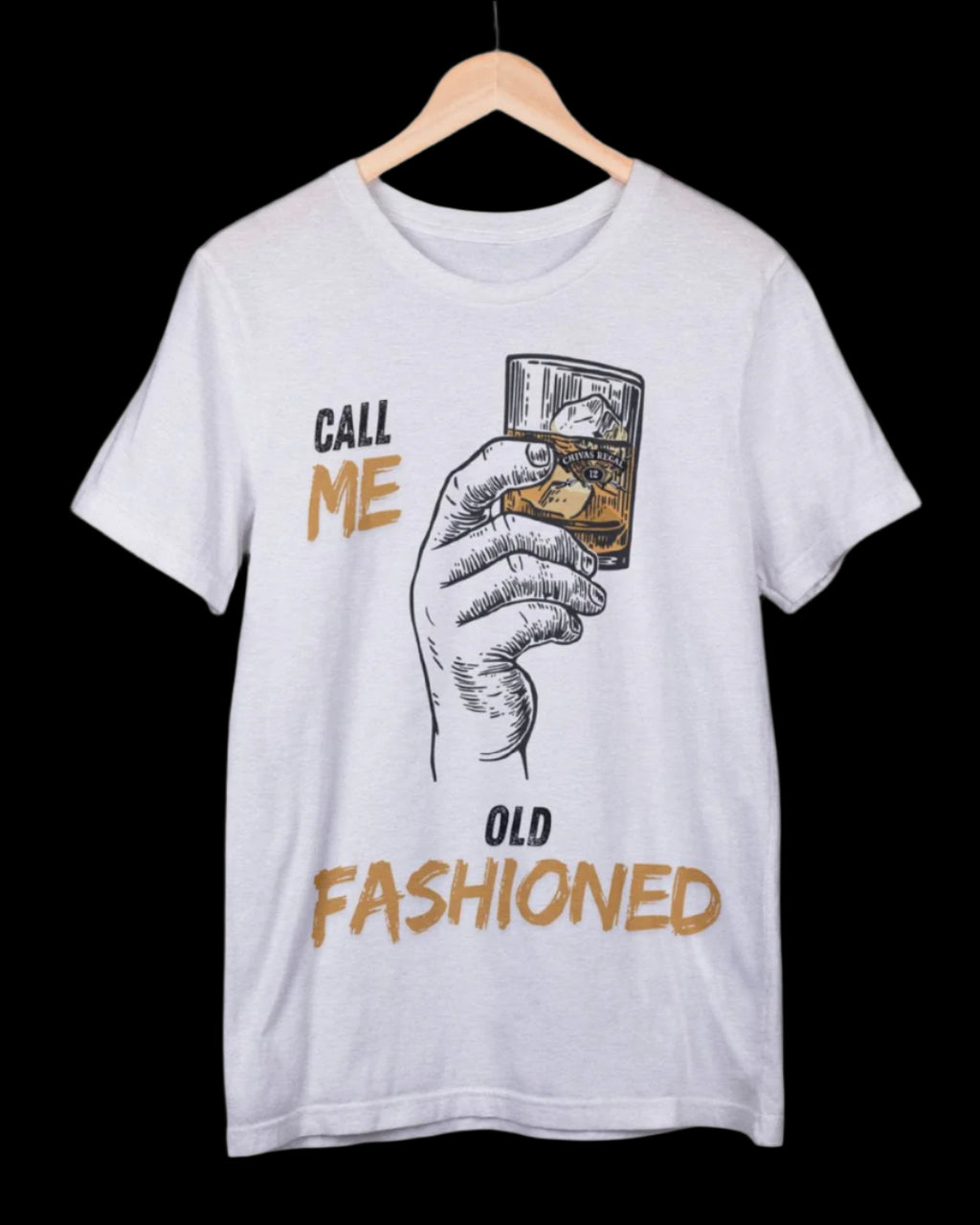 White t-shirt with graphic of a hand holding a glass and text 'Call Me Old Fashioned' on a hanger.